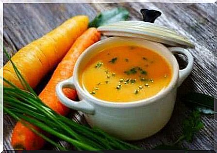 A bowl of carrot soup