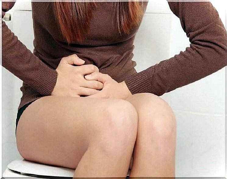 girl sitting on the toilet