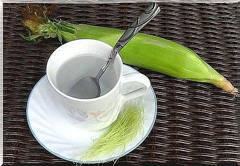 Cup of water and corn silk