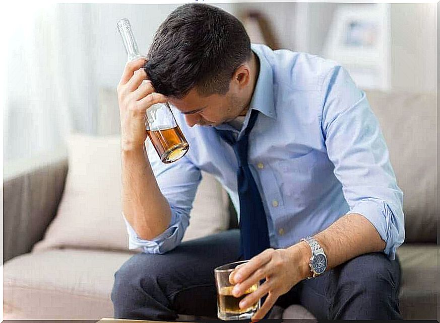 Man drinks alcohol